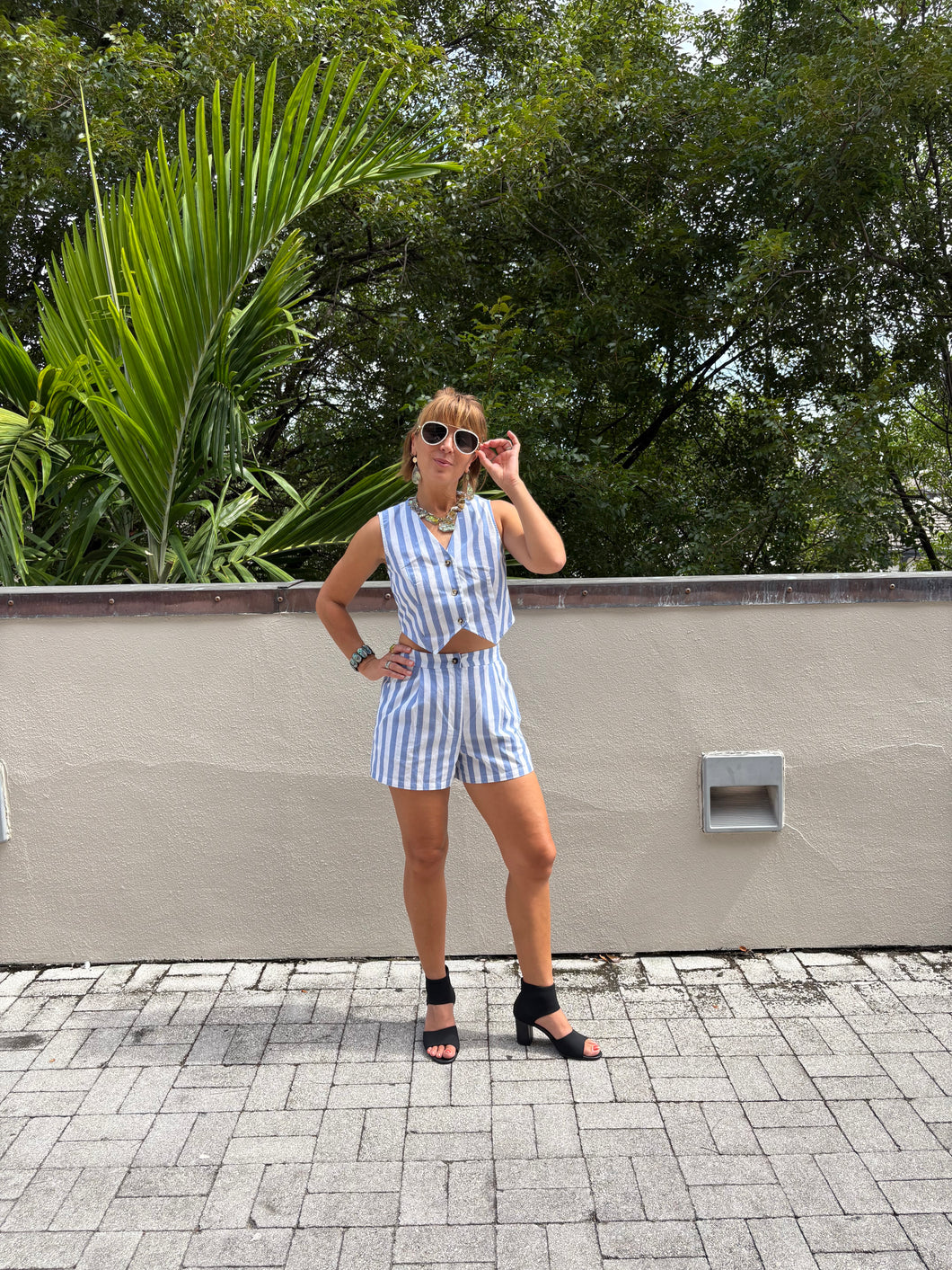 From Victoria’s Closet: Blue and White Striped Ladies shorts and vest ensemble in Size Small