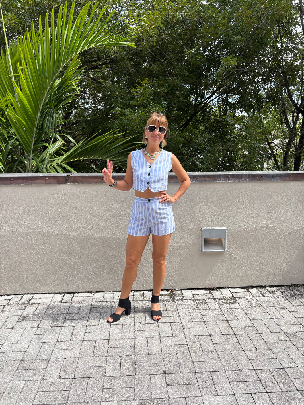From Victoria’s Closet: Blue and White thin Striped Ladies shorts and vest ensemble in Size Small