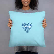 "NAUTI" fish heart pillow in blizzard blue with navy fish heart and white logo