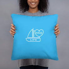 "NAUTI" boat life pillow in deep sky blue with white logo