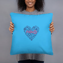 "NAUTI" fish heart pillow in deep sky blue with navy fish heart and magenta logo