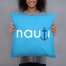"NAUTI" pillow in deep sky blue with white logo and blue anchor