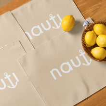 "NAUTI" Placemat Set in Champagne with White Logo