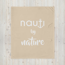 "NAUTI BY NATURE" blanket in champagne with white logo