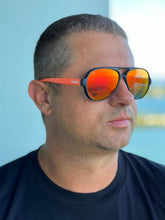 Nauti Aviators - Floating Polarized Unisex Sunglasses. Blaze Orange Lens on Orange Two-Tone (Opaque) Frame.