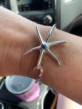 Ladies Starfish Bangle Bracelet from Nau-T-Girl in Silver with Blue Imitation Stone